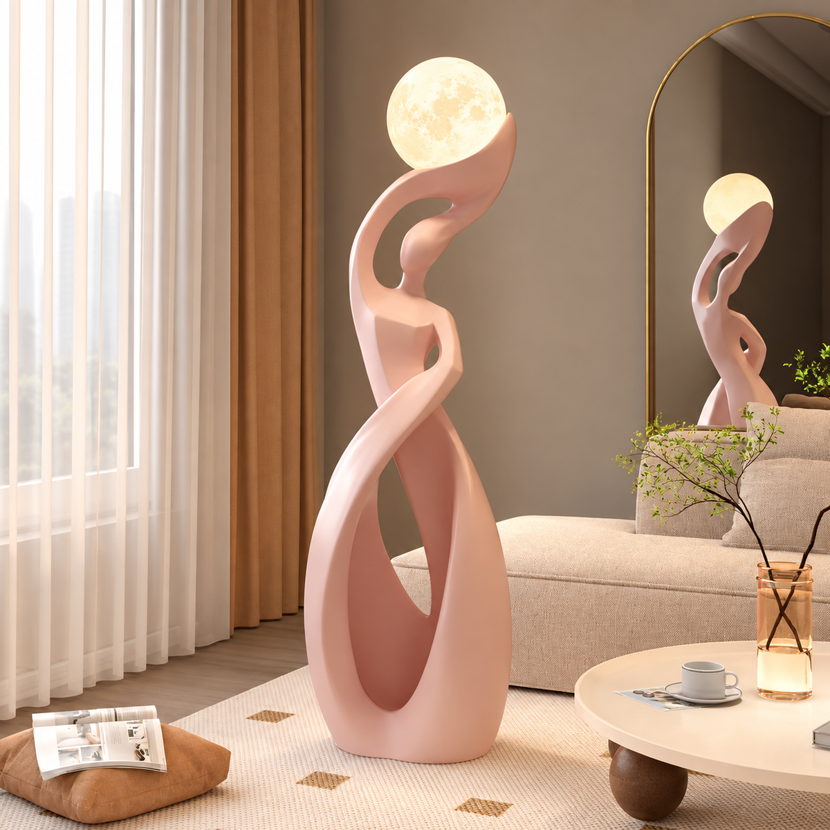 A pink abstract sculptural floor lamp with a glowing moon globe bulb stands in a modern living room next to a sofa and coffee table.