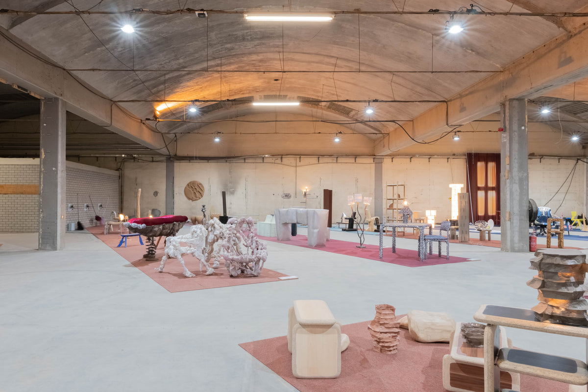 Sculptural furniture collections displayed between concrete columns at Forward Furniture 2025