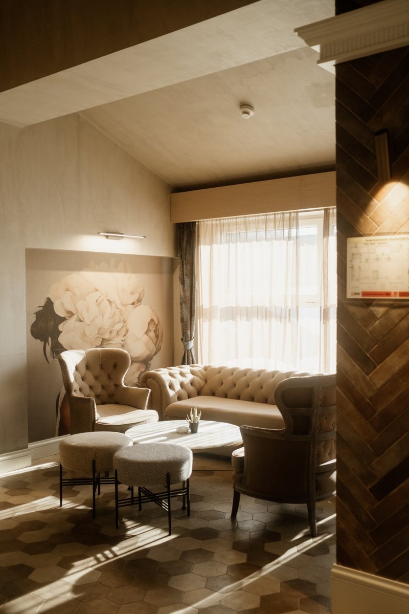 Hotel corner interior: examine the interaction between upholstery, pattern and colour.