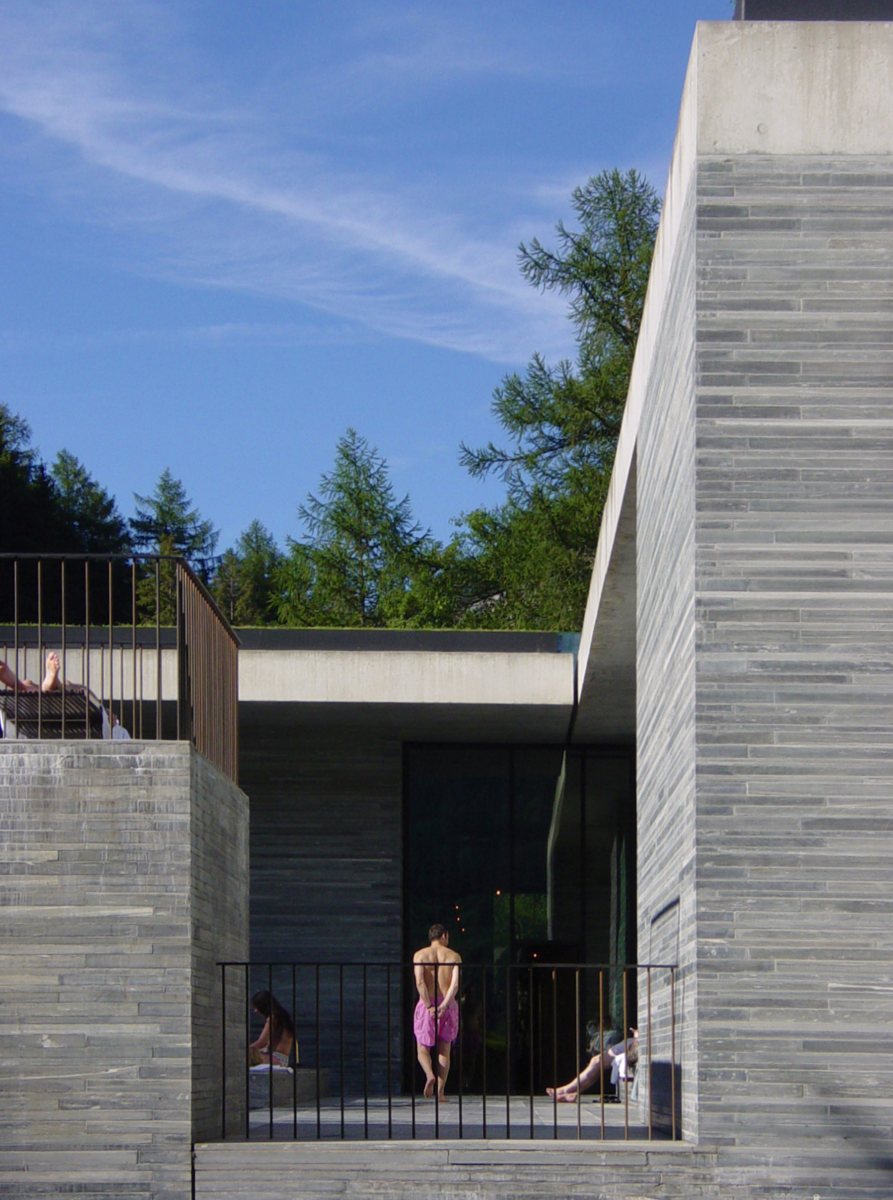 Therme Vals: a narrow opening frames the transition between stone, water and daylight.