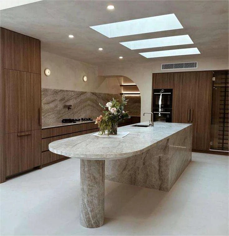 Integrated marble sink and natural stone countertop detail
