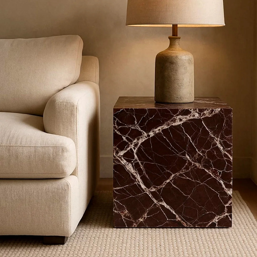 Dark marble console table in a refined contemporary interior