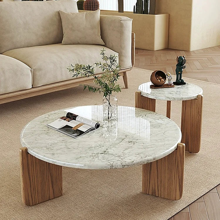 Marble coffee table styled in a warm contemporary living room