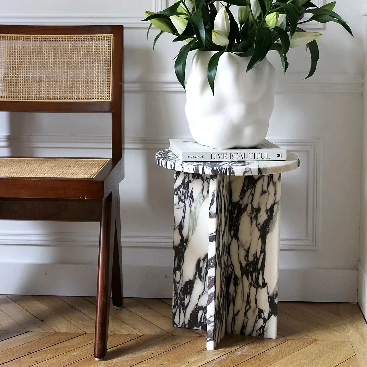 Monochrome natural stone console with minimalist sculptural proportions