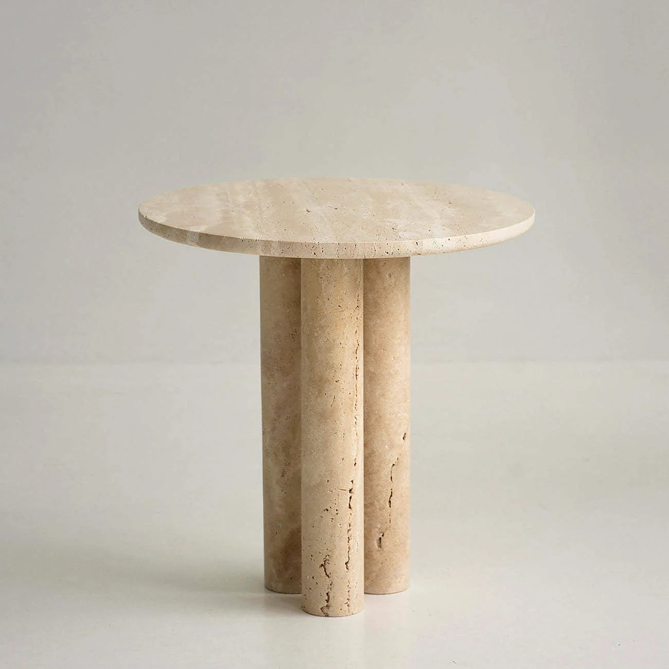 Sculptural natural stone pedestal furniture with organic form