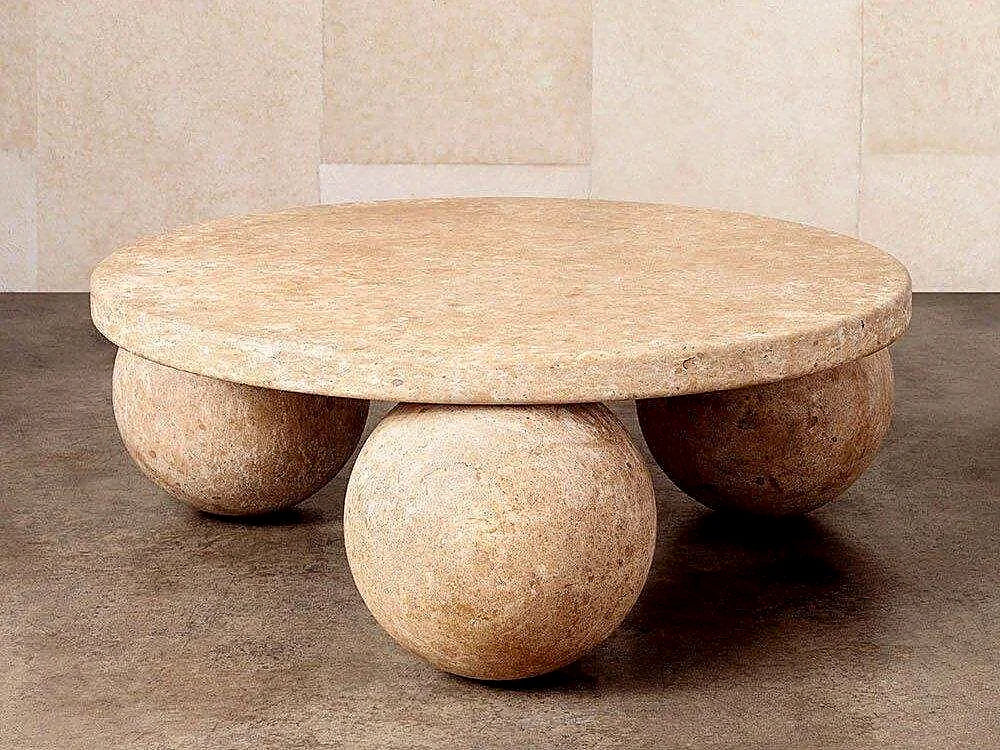 Sculptural travertine table with spherical stone form