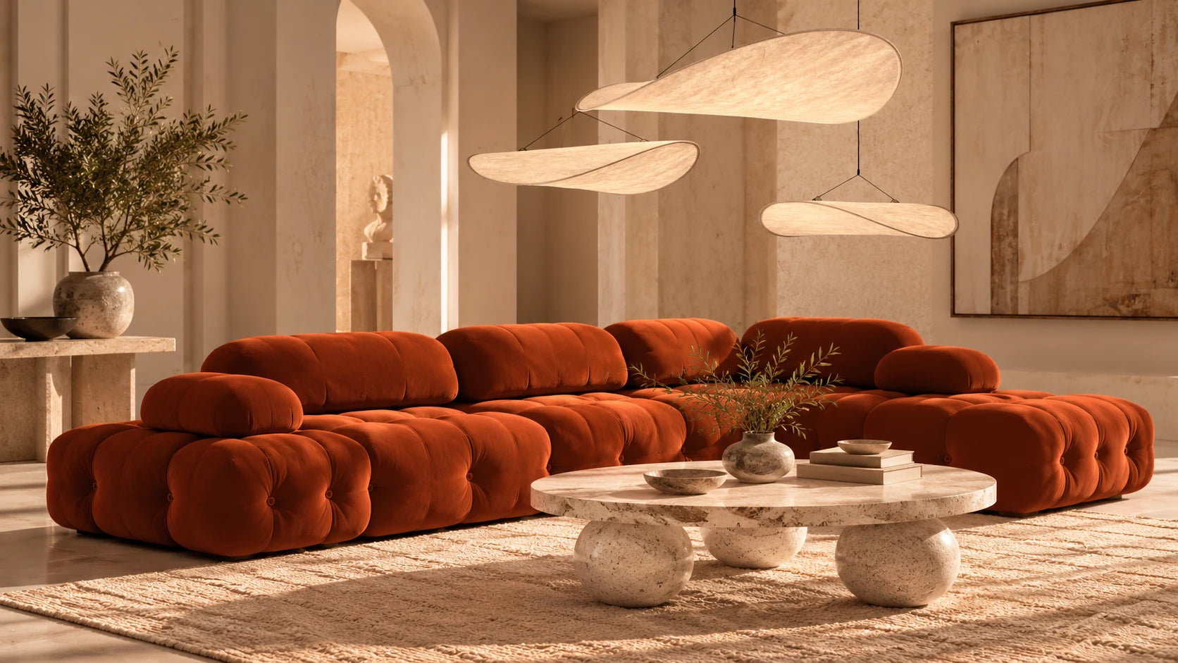 Lise Luxury interior with terracotta modular sofa, sculptural stone coffee table and organic pendant lighting